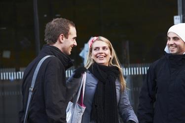 Photo of three people outdoor